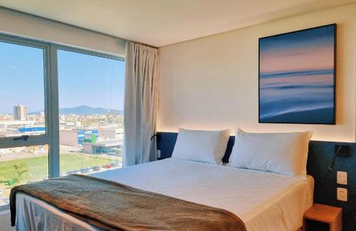 Florianopolis Apartment | Pet-Friendly Atrium Studios by Xtay with High Guest Ratings