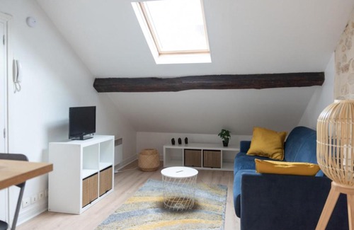 Saint-Mande Apartment | Charming Attic Apartment with Exposed Beams & Family-Friendly