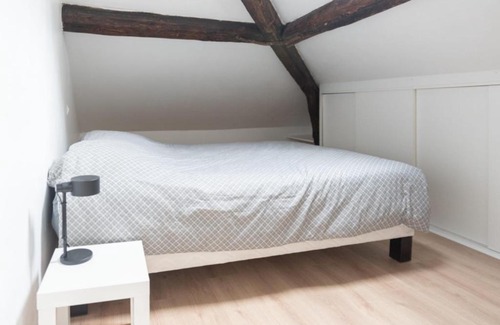 Saint-Mande Apartment | Charming Attic Apartment with Exposed Beams & Family-Friendly