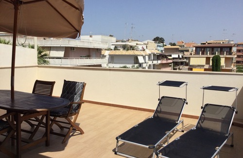 Pozzallo Apartment | Stylish Attic with Sea View and Terrace, 5 Min to Beach