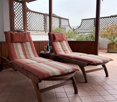 Quartiere XXXIII Lido di Ostia Ponente Apartment | Oceanfront Retreat: Attico con terrazza, Rated 9.8/10
