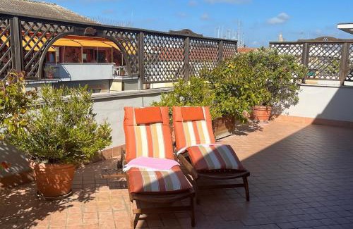 Quartiere XXXIII Lido di Ostia Ponente Apartment | Oceanfront Retreat: Attico con terrazza, Rated 9.8/10