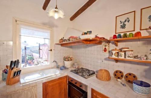 Oristano Apartment | Charming Penthouse with Tower Views - Pet Friendly Retreat