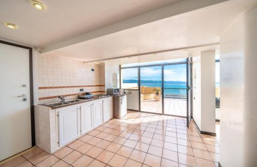 Poetto Apartment | Beachfront Retreat: Attico sul Poetto, 4-Star Gem