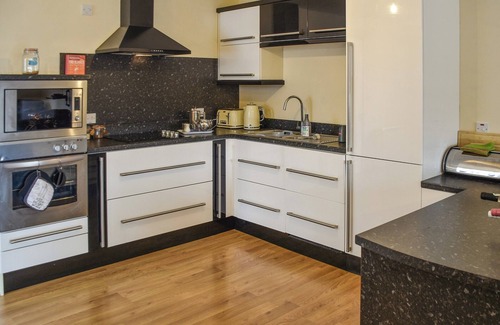 Horning Cottage | Attractive "upside down" waterside home, with four en-suite bedrooms.