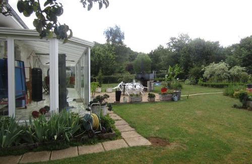 Fagnon Bed & Breakfast | Island Retreat at au jardin Fessard with Ocean View
