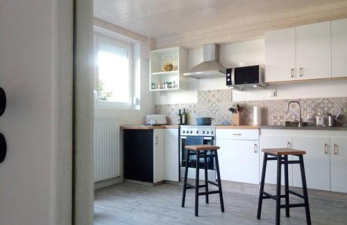 Issoire Apartment | Calm Garden Retreat with Parking, Rated 9/10 by Guests