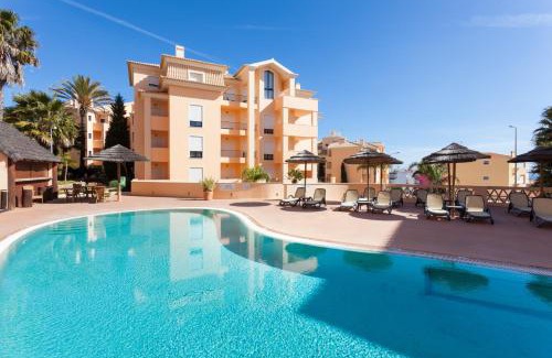 Praia da Luz Apartment | Oceanfront Aum Praia da Luz Resort with Hot Tub & Spa