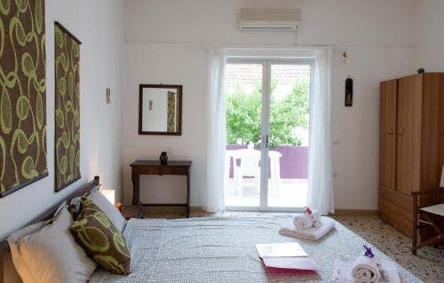 Eresos-Antissa Apartment | Pet-Friendly Aumkara with Ocean View and Breakfast
