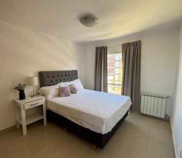 General Fernandez Oro Apartment | Inviting Aura: Guest Rated 9.1, Pet & Child Friendly