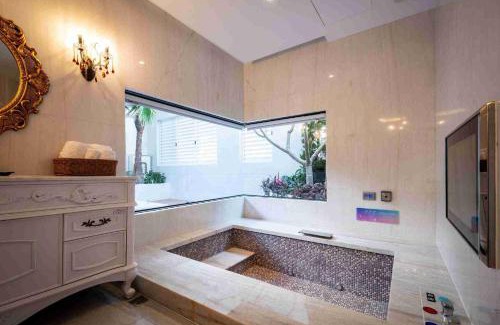 Beitun District Hotel | Relaxing Stay at AURORA MOTEL with Spa & Hot Tub Access