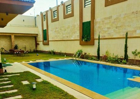 Sheikh Zayed City Villa | Aurora Sky View Suite: 4-Star Comfort with Pool & Hot Tub