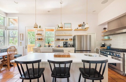 Swede Hill House | Elegant Victorian Summer House in East Austin with Pool