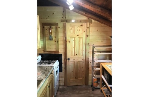 Northome Cabin | Pet-Friendly Log Cabin Retreat at Northshore Bay Resort