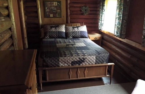 Northome Cabin | Authentic Log Cabin Retreat with Pet Friendly Amenities