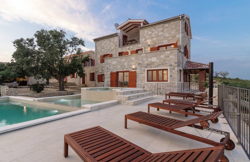 Tinj Villa | Unique Stone Villa with Private Pool and Family-Friendly Amenities