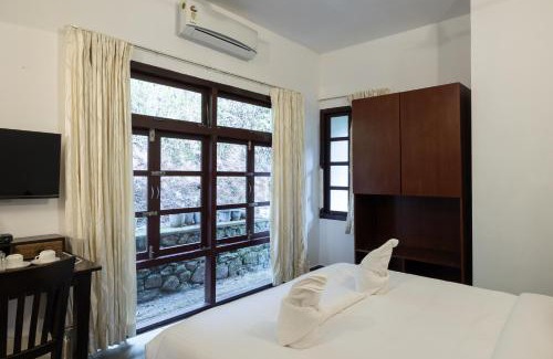 Udumbanchola Hotel | Experience Avadale Munnar with Pool & Family-Friendly Amenities