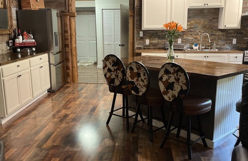 Alberton Cabin | Tranquil Family Cabin with Creek and Hot Tub Amenities