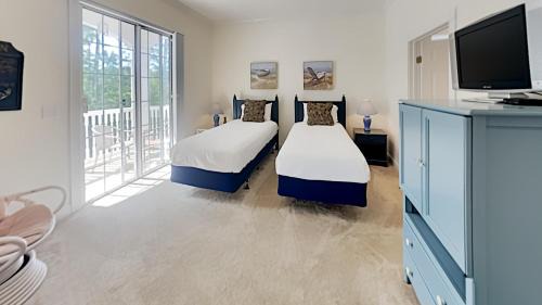 North Litchfield Beach Villa | Avian Forest Oasis: Your Ideal Retreat for Golf and Beach Fun