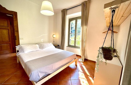 San Pellegrino Terme Apartment | Pet-Friendly Retreat at AvocadoHouse3 with QCview
