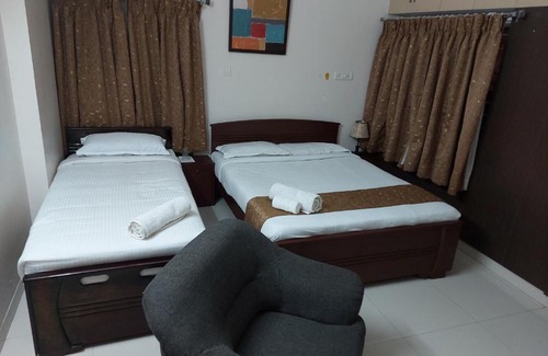 Chennai Apartment | Avuraa Oak Hills: Cozy Stay with Kitchen & Breakfast Options