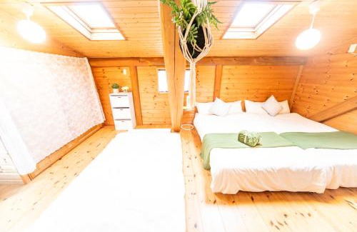 Awaji House | Pet-Friendly Awaji Seaside Log House with Hot Tub
