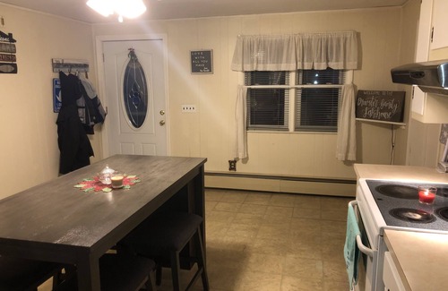 Coventry House | Lakefront Retreat: 2 BD House on Johnson’s Pond, Rated 9.8