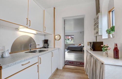Tejn Apartment | Inviting Vacation Apartment Steps from the Water's Edge