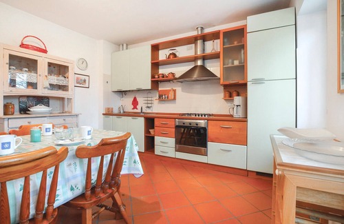 Luino Apartment | Cozy Apartment with Ocean Views and Lush Garden Retreat