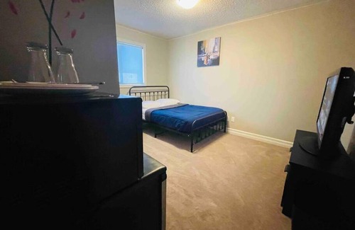 Northwest Edmonton House | Cozy Bedroom with Family-Friendly Amenities and Great Reviews