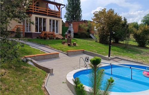 Aljmas House | Inviting Two-Bedroom Home with Pool in Aljmas