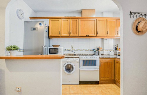 Els Arenals del Sol House | Welcoming Cottage Near Sandy Beach with Shared Pool Access