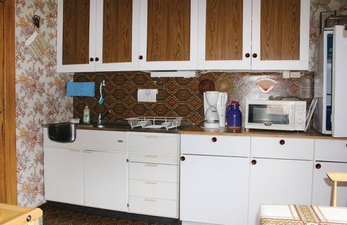 Fresvik House | Experience a Cozy Cottage Amidst Scenic Orchards