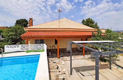 Lliria House | Experience Beautiful Moments at Our Poolside Vacation Home