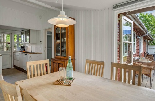 Beder Malling House | Discover the Inviting Red Cottage at Ajstrup Beach