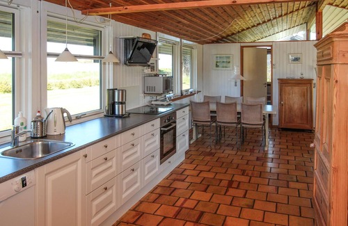 Langemark House | Experience Breathtaking Sea Views in Our Terrace Home
