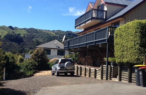 Akaroa House | Welcoming House: Bright Holiday Home with Pool & Parking