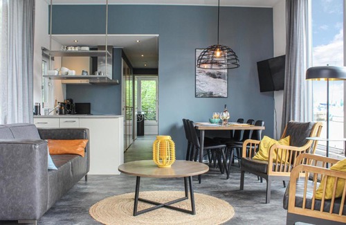 Stavoren Boat Rental | Inviting Ship Retreat in Warns with Family-Friendly Kitchen