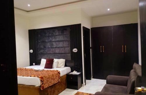 Asaba Hotel | Awhite hotel and suite
