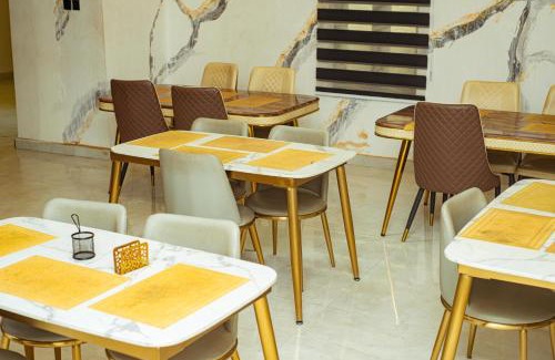 Asaba Hotel | Awhite hotel and suite
