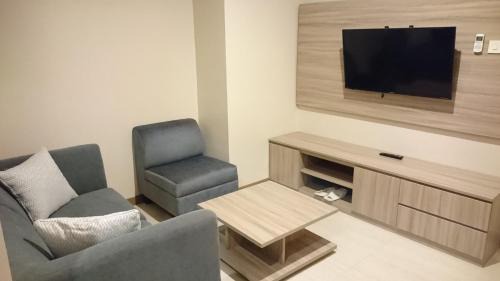 Kuningan Hotel | Discover Ayaka Suites: Family-Friendly with Pool & Breakfast