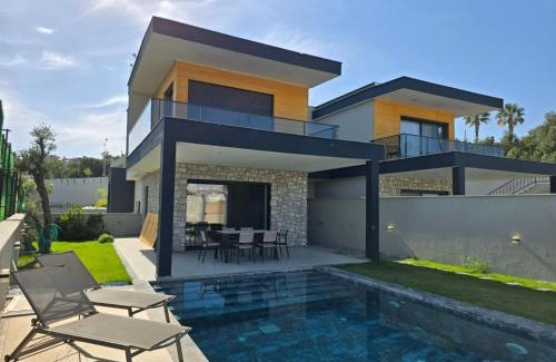 Cesme Villa | Experience Ayayorgi: Family-Friendly Poolside Retreat