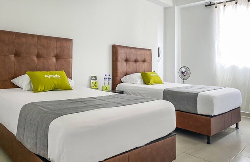 Dosquebradas Hotel | Discover Ayenda 1138 Apartahotel 109: Family-Friendly Comfort