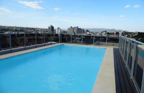 Villa Carlos Paz Apartment | Ayres de Las Sierras: Family-Friendly Stay with Pool
