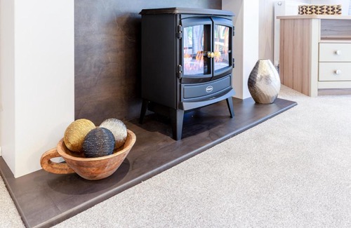 Weybourne Apartment | Experience Azenor Lodge: Pet-Friendly Retreat with Hot Tub