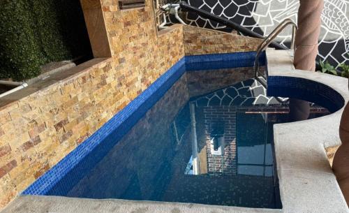 Tepoztlan Apartment | Azomalli: Pet-Friendly Retreat with Pool and Family Fun