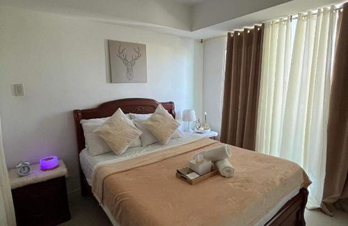 Don Bosco Apartment | Gorgeous Azure Resort Condo: Beachfront Bliss Awaits