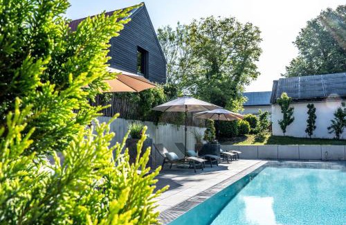 Buchelberg Ski Chalet | Relax at Büchelbergerei - Chaletdorf with Spa & Pool Access