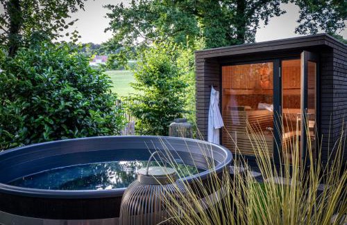 Buchelberg Ski Chalet | Relax at Büchelbergerei - Chaletdorf with Spa & Pool Access