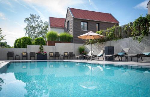 Buchelberg Ski Chalet | Relax at Büchelbergerei - Chaletdorf with Spa & Pool Access